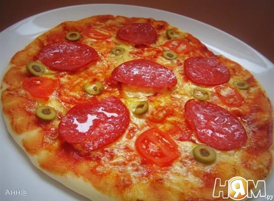Пицца с  томатами и оливками