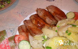 Свиные стейки под соусом с запеченым картофелем